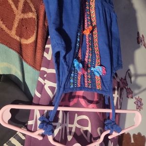 Gently used size 2T girl rompers